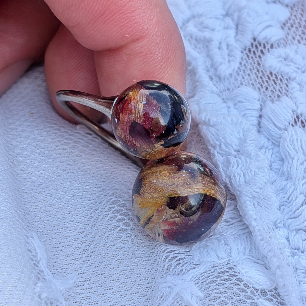 Double sphere tulip resin ring on white lace fabric detail shot – EL-Creations