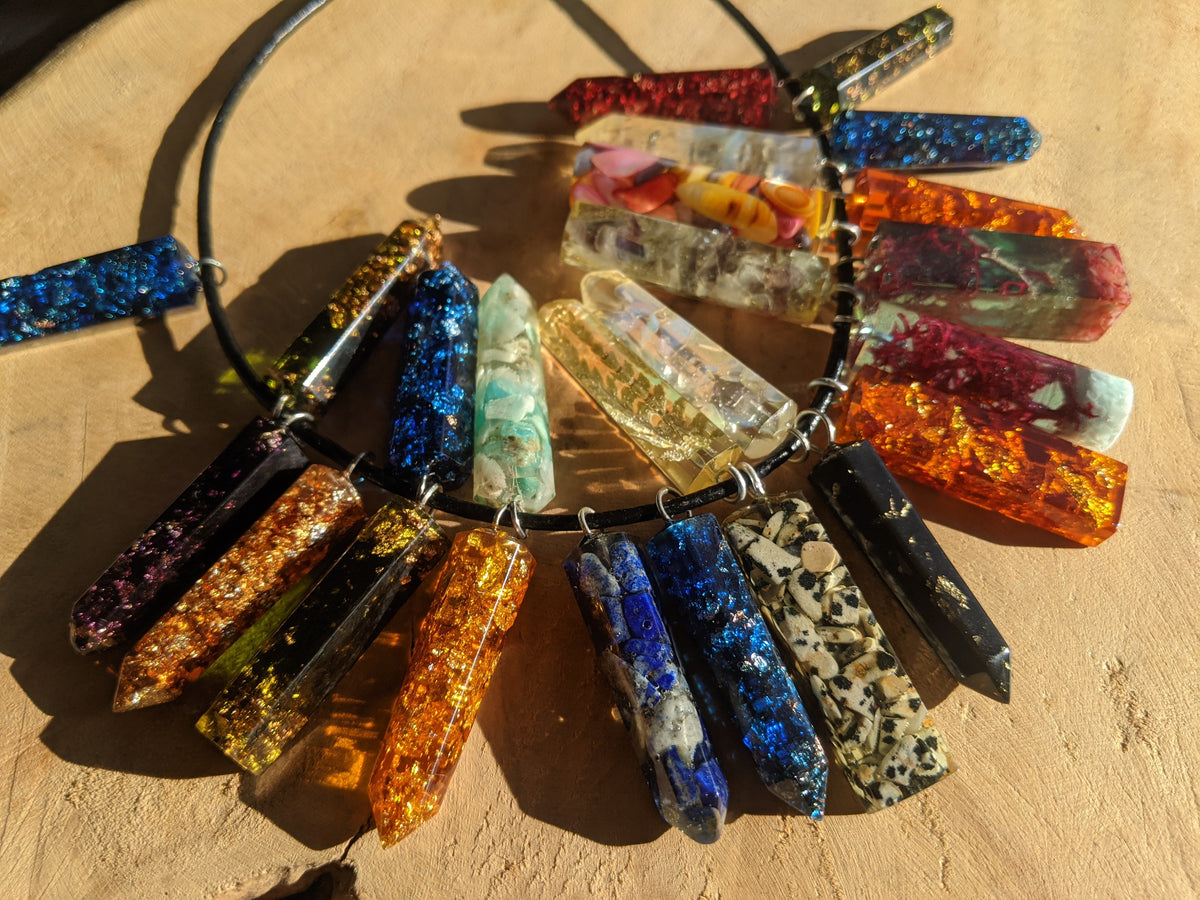 Collection of handmade resin necklaces, crafted in Belgium — EL Creations