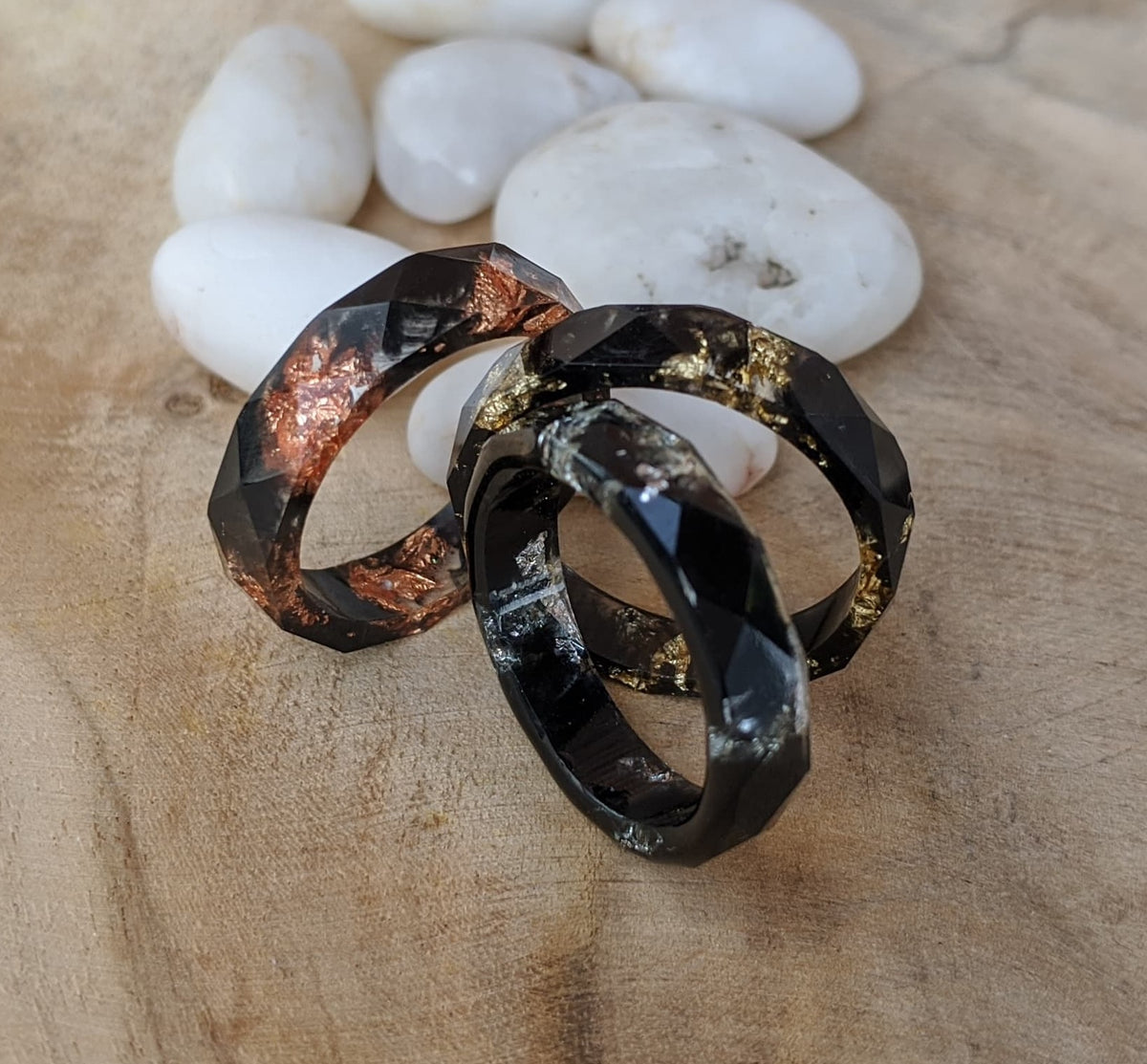 Thin black resin band ring - on hand view