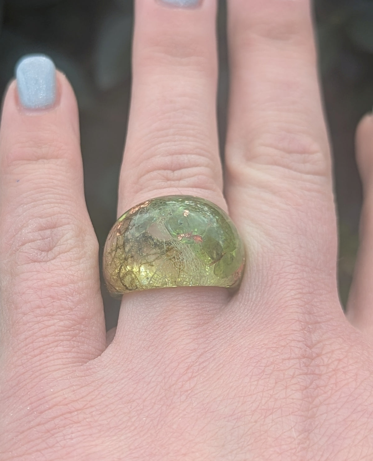 Handmade botanical jewelry with peridot crystal and skeleton leaf by EL-Creations