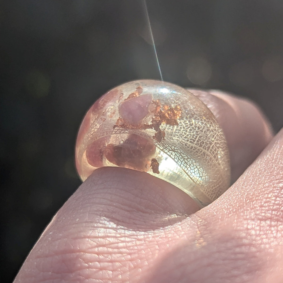 Pink tourmaline resin ring with skeleton leaf and copper flakes by EL-Creations