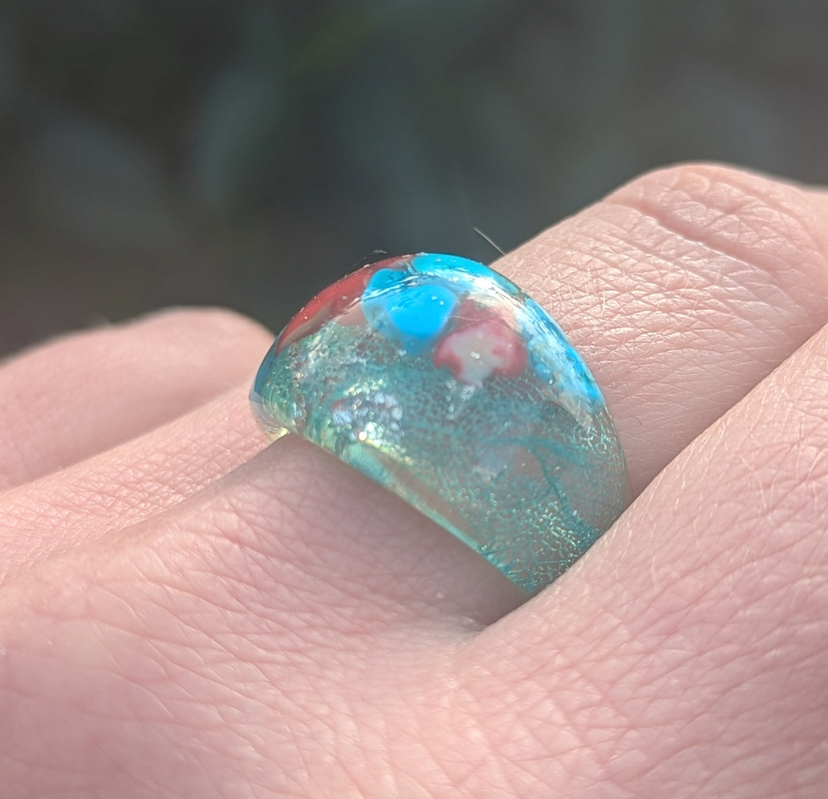 Crystal clear resin ring with turquoise red coral and silver flakes by EL-Creations