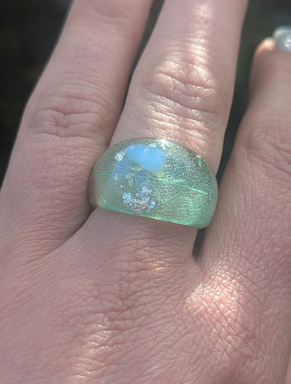 Aquamarine and botanical leaf ring - front view showing stone