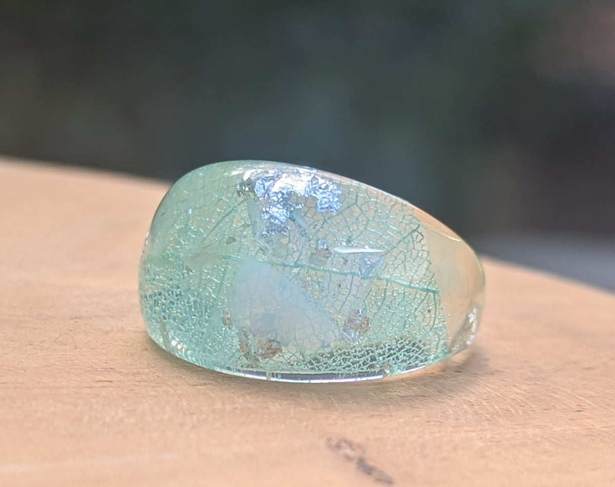 Blue aquamarine resin ring featuring real leaf and silver flakes by EL-Creations