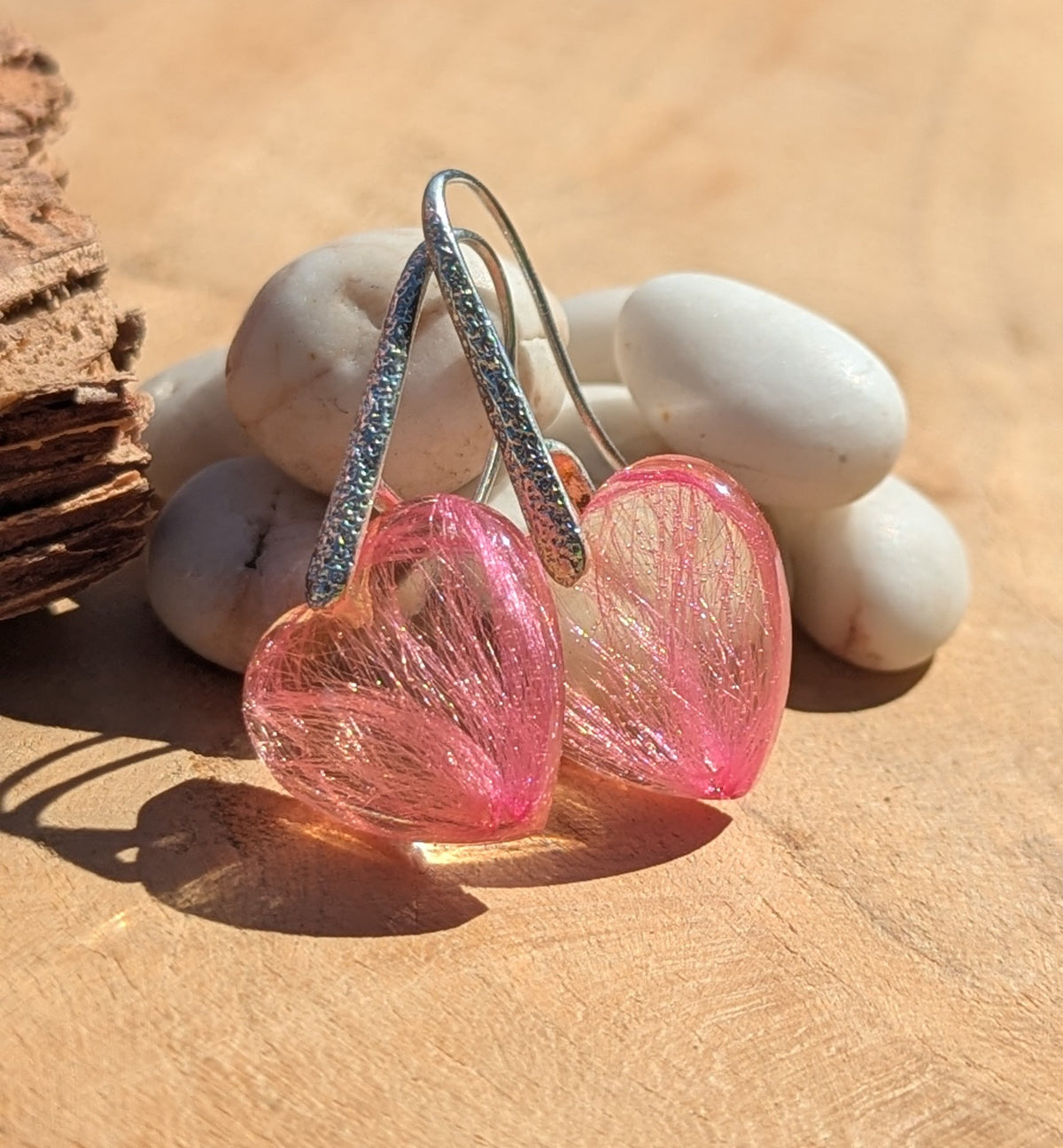 Real pink flower botanical heart resin earrings top view, romantic jewelry handmade in Belgium