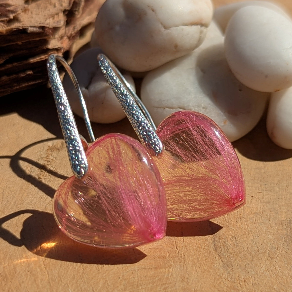 Handmade pink heart-shaped resin earrings with real pink pressed flowers, sterling silver hooks, EL Creations Belgium