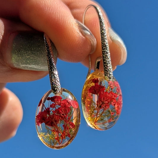 Handmade oval resin earrings with real red pressed flowers and forest moss, sterling silver hooks, EL Creations Belgium