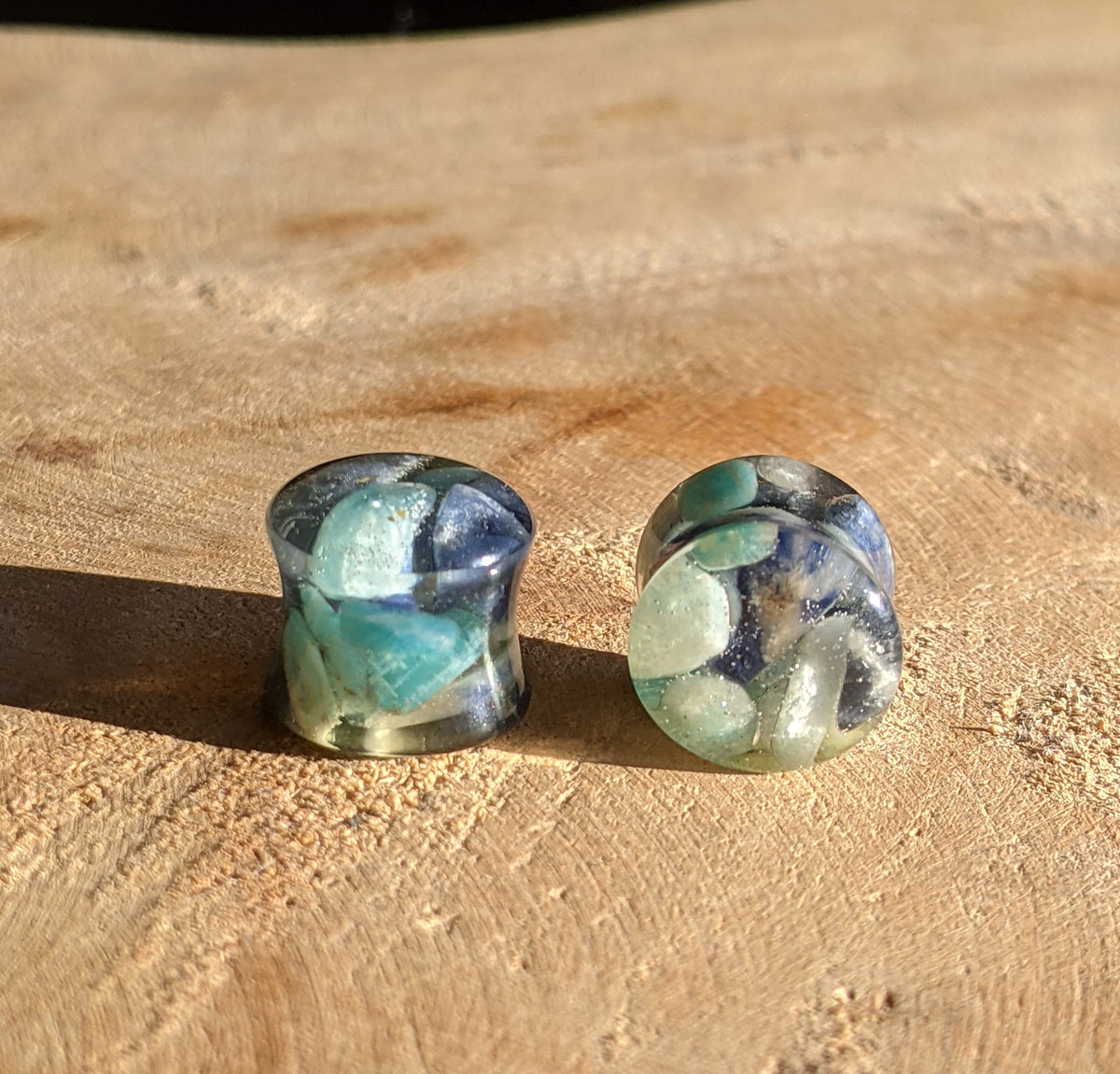 Close up of natural lapis lazuli and amazonite preserved in resin EL-Creations