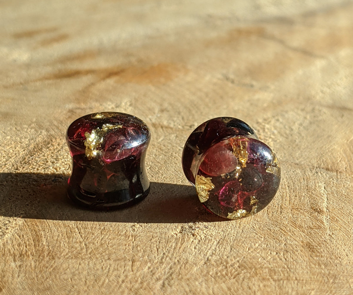 Handmade stretched ear plugs featuring real garnet inside resin EL-Creations