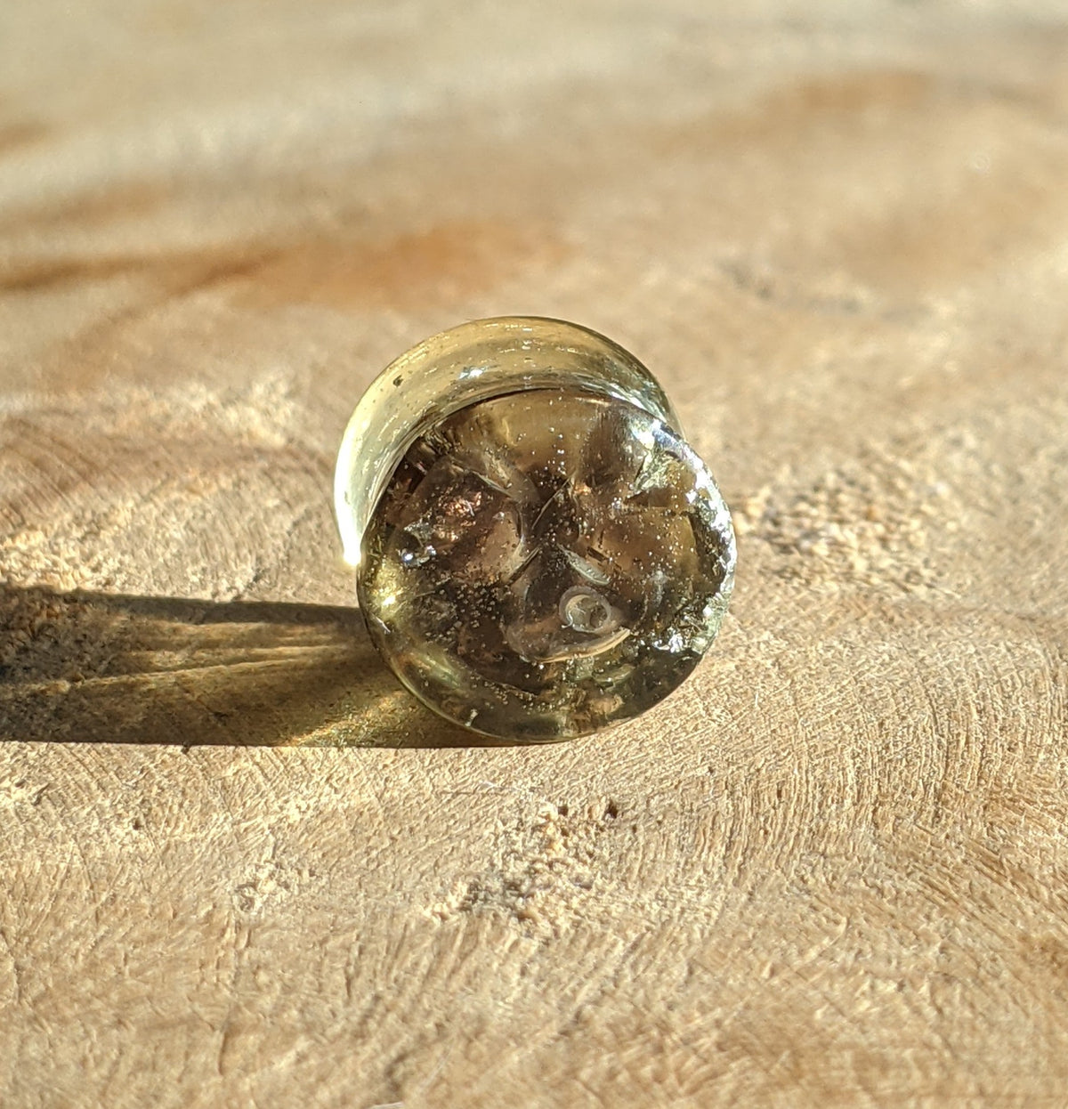 Close up view of colourful gemstone resin plugs EL-Creations