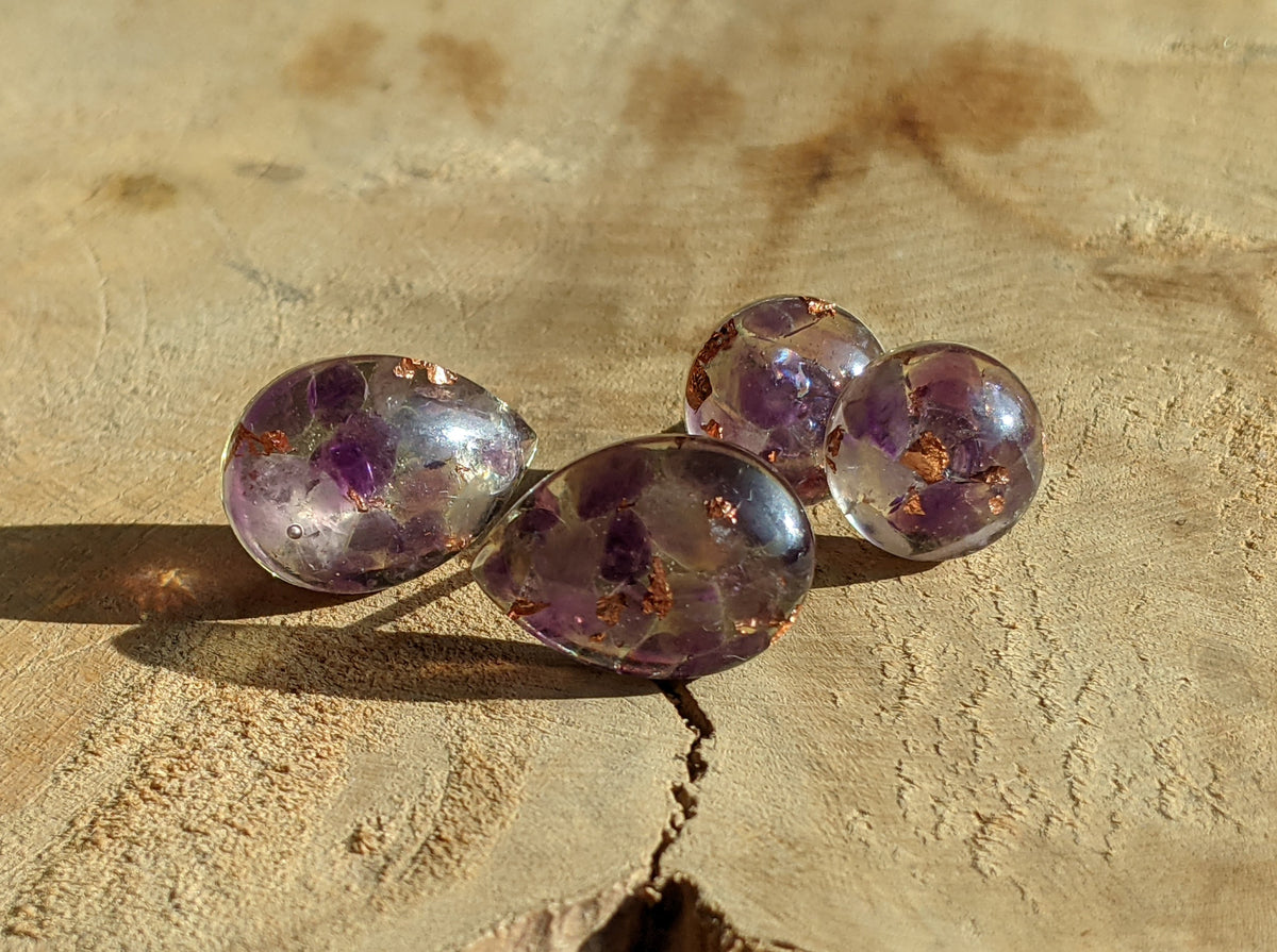 Amethyst resin circle stud earrings on stone surface, everyday gemstone jewelry EL Creations