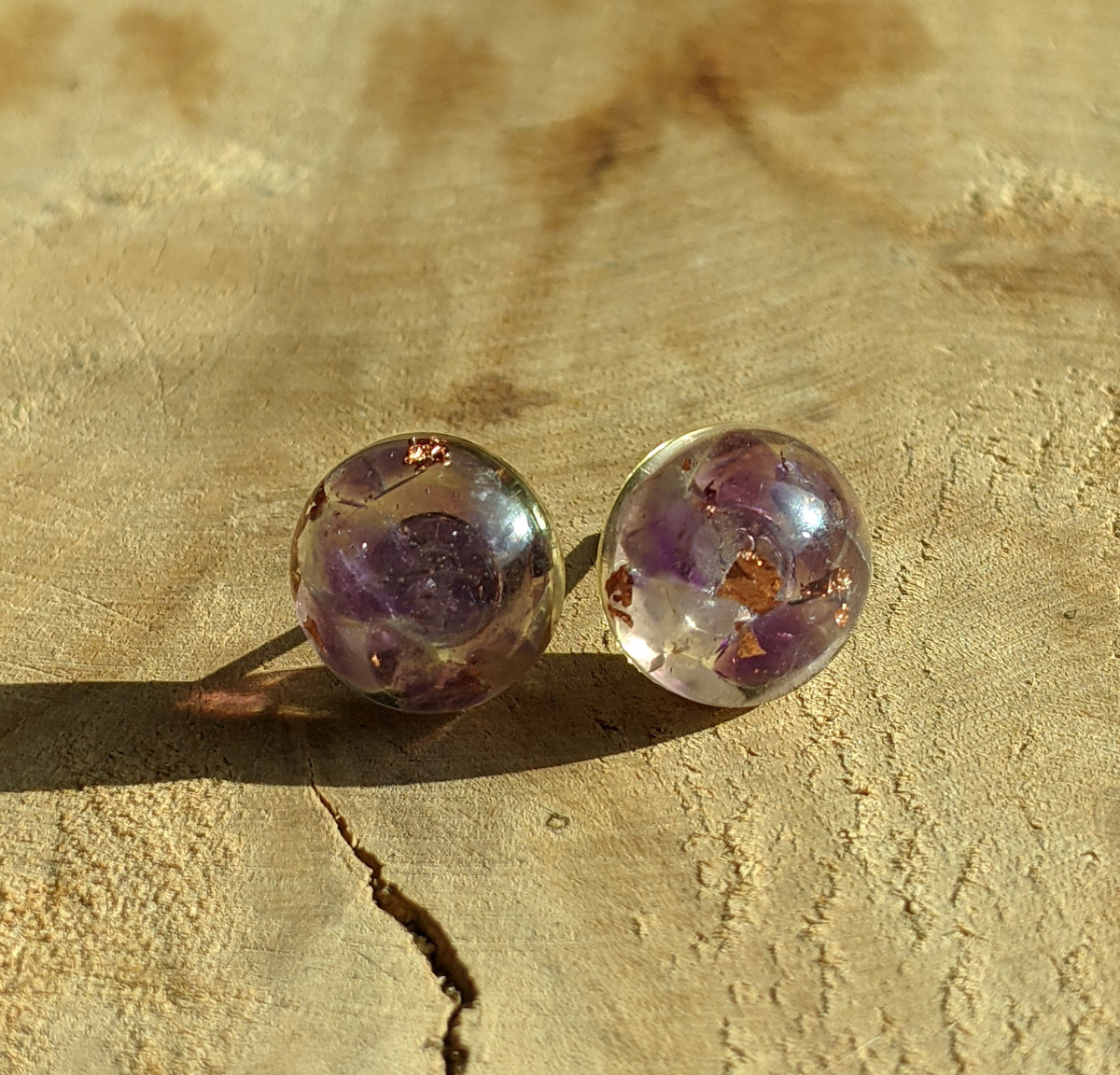 Handmade amethyst resin stud earrings worn on ear, small everyday gemstone jewelry EL Creations