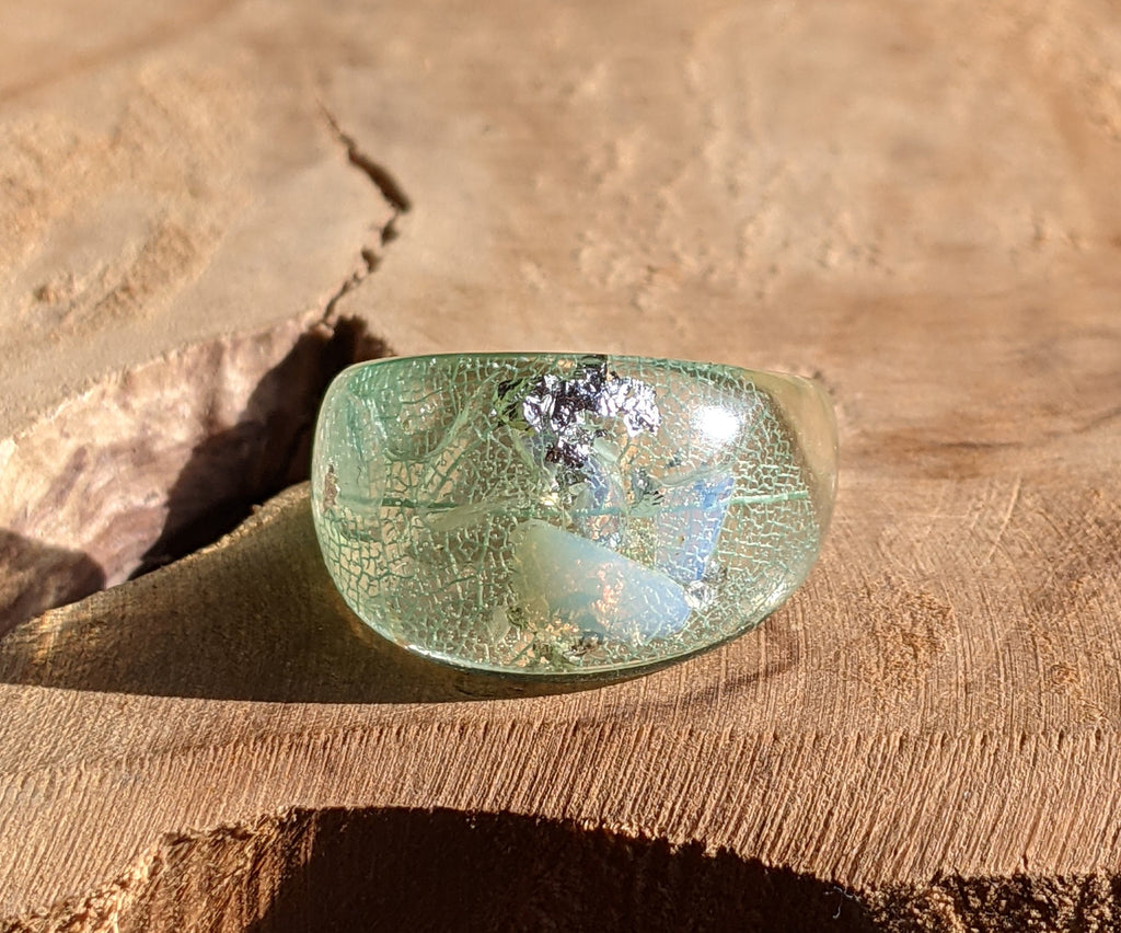 Handmade aquamarine leaf ring - back view on wood