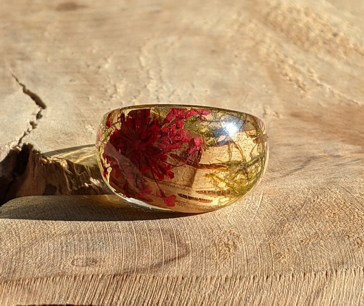 Crystal clear resin ring with birch bark red flower and moss by EL-Creations