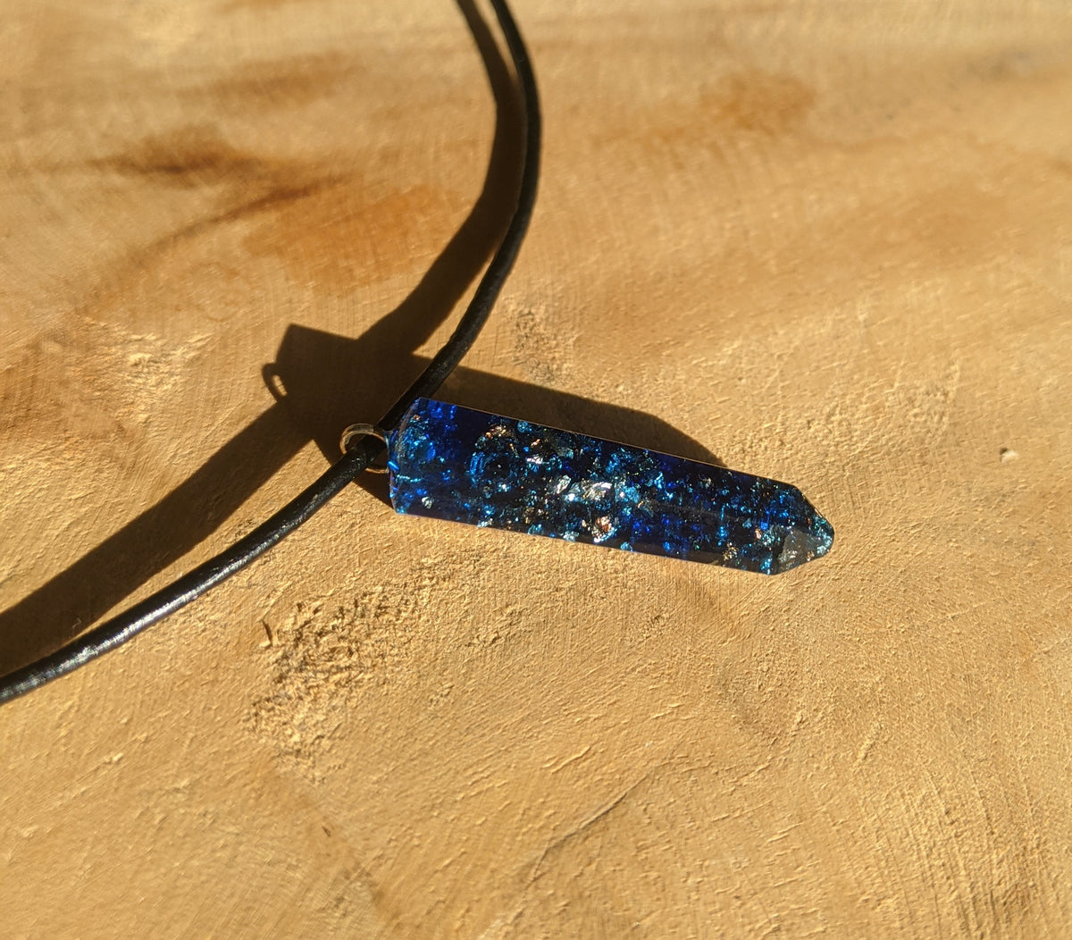 Handmade blue resin pendant with shimmering metallic flakes EL-Creations