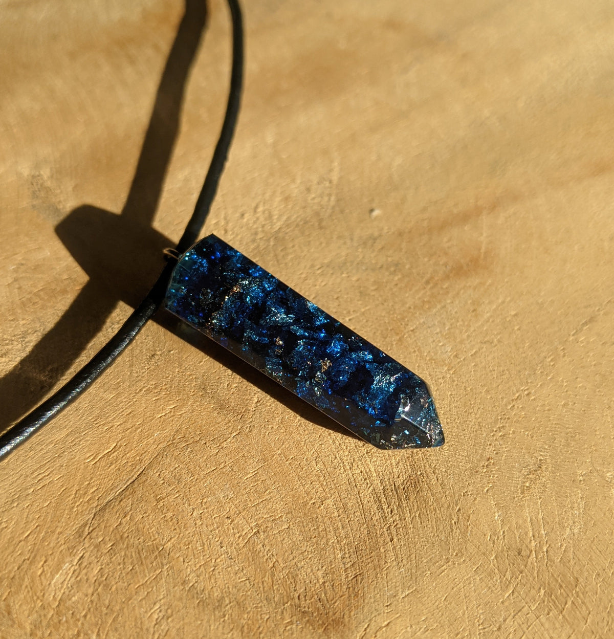 Crystal point blue resin necklace with adjustable black textile cord EL-Creations