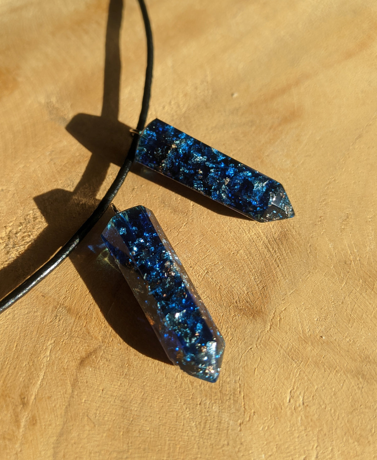 Modern blue resin jewelry pendant handcrafted by EL-Creations