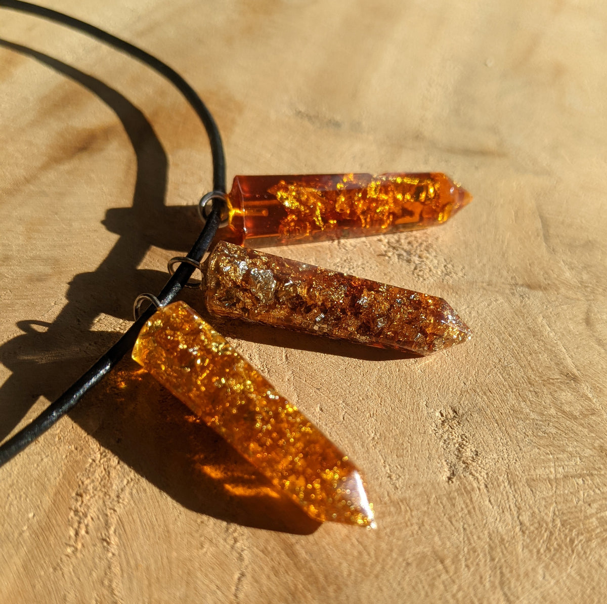 Unisex amber resin pendant handcrafted in Belgium EL-Creations