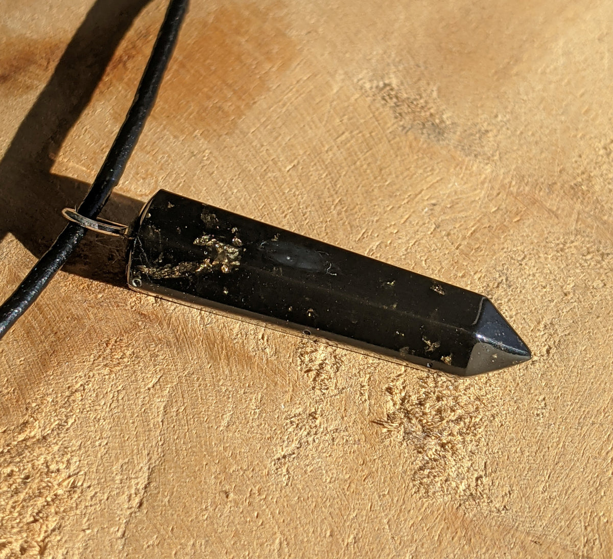Handmade black resin crystal pendant necklace with shimmering gold flakes EL-Creations