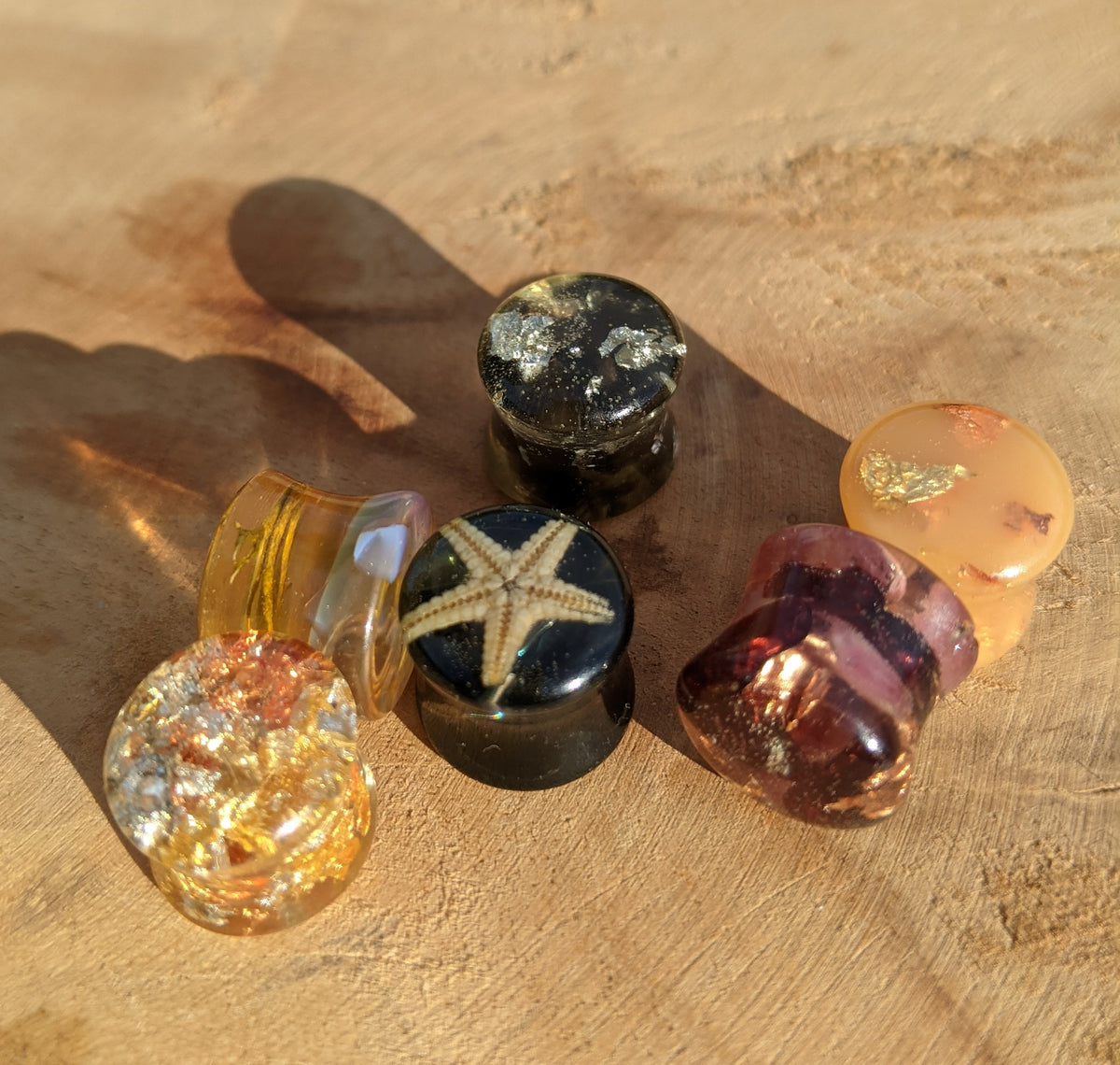 Complete six piece handmade resin ear plug collection EL-Creations