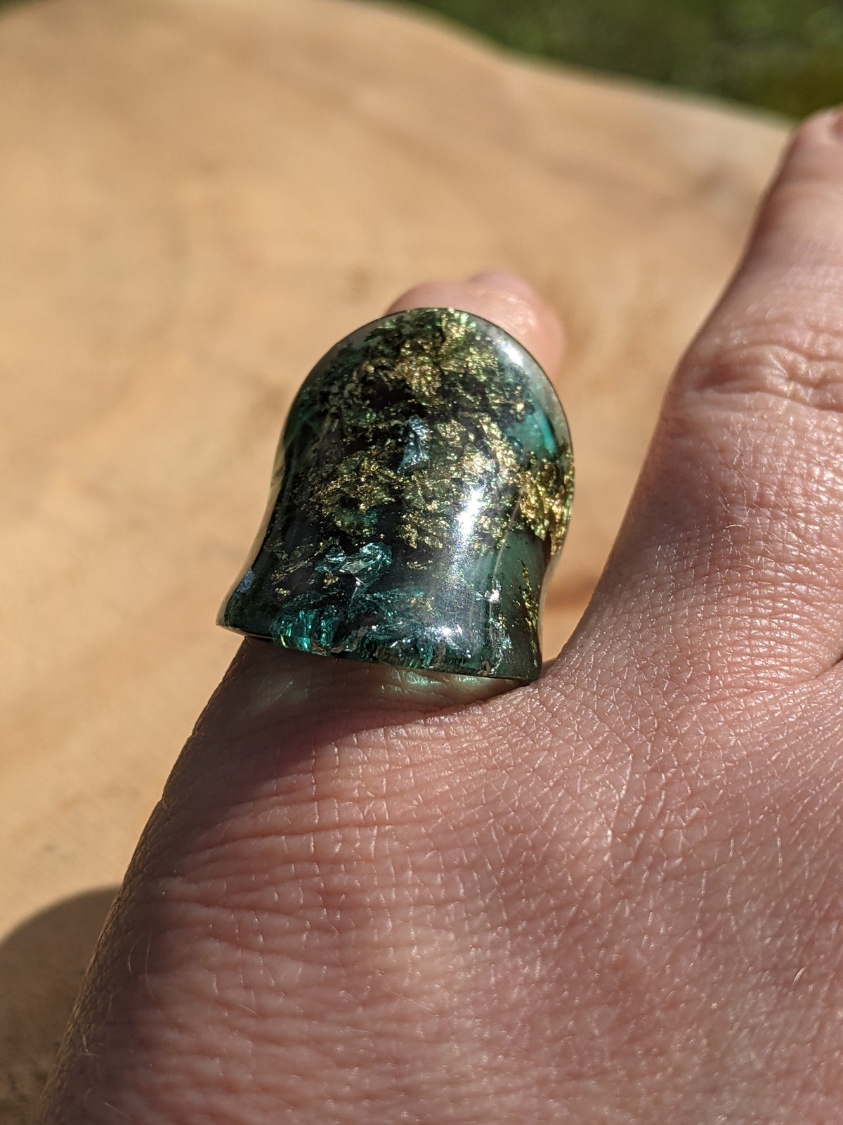 Glossy green resin statement ring handcrafted by EL-Creations