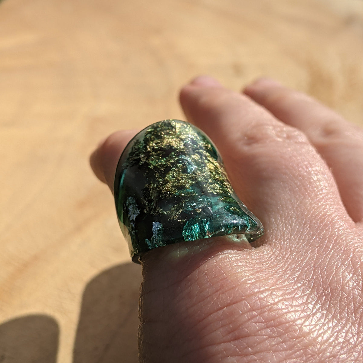 Unique emerald green resin ring with metallic flakes by EL-Creations