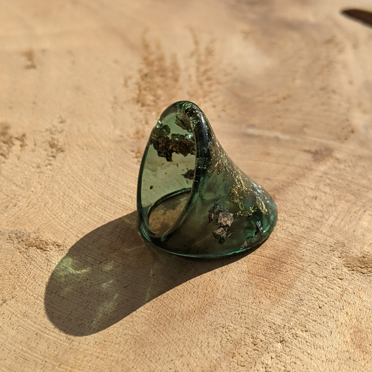 Emerald green resin ring with metallic gold and silver flakes by EL-Creations