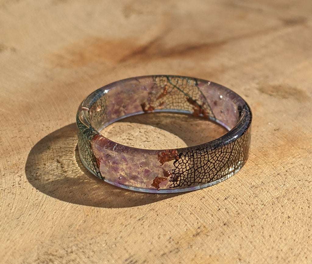 Decorative resin ring on a wooden surface