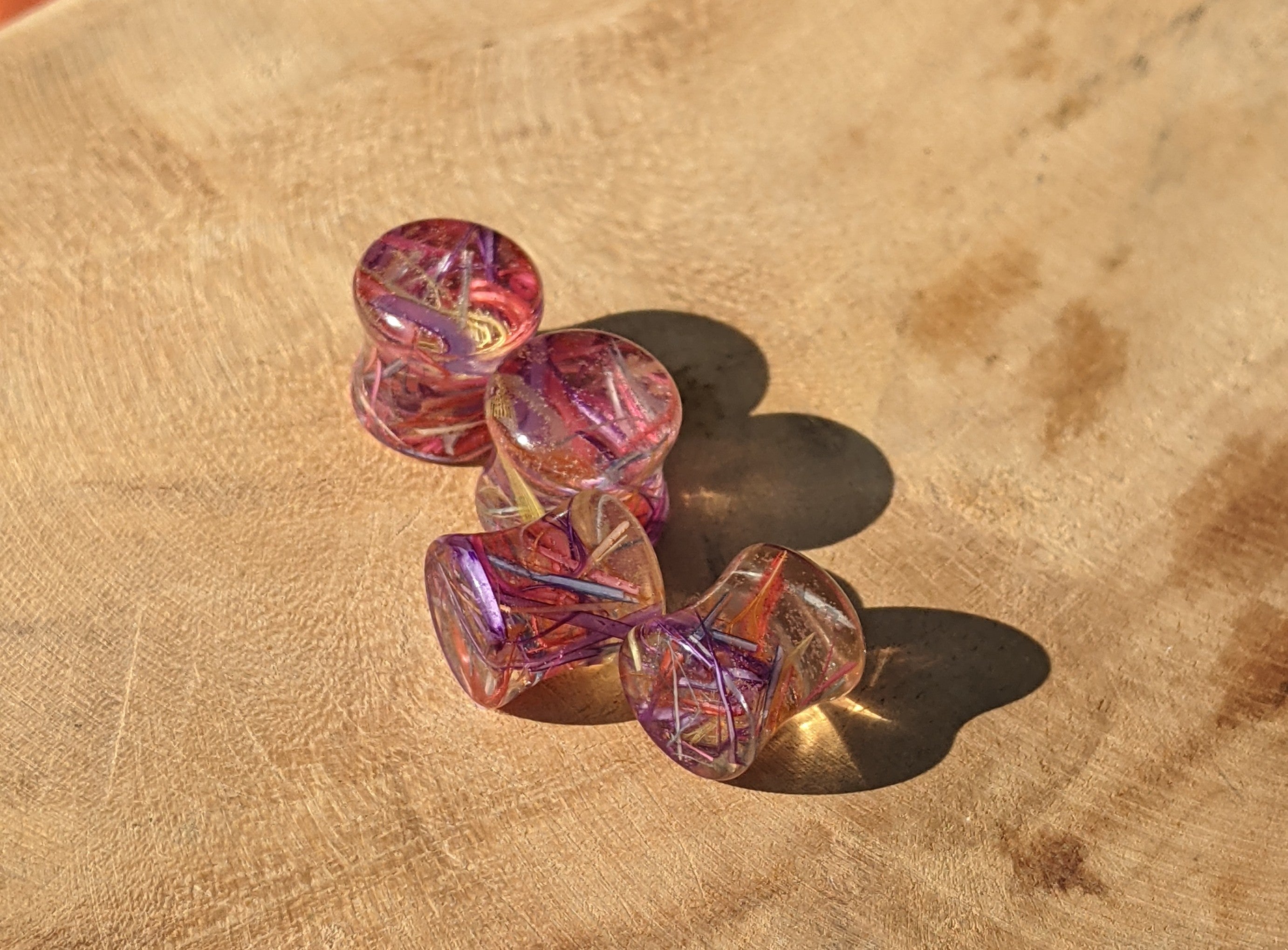 Set of colorful dice on a wooden surface