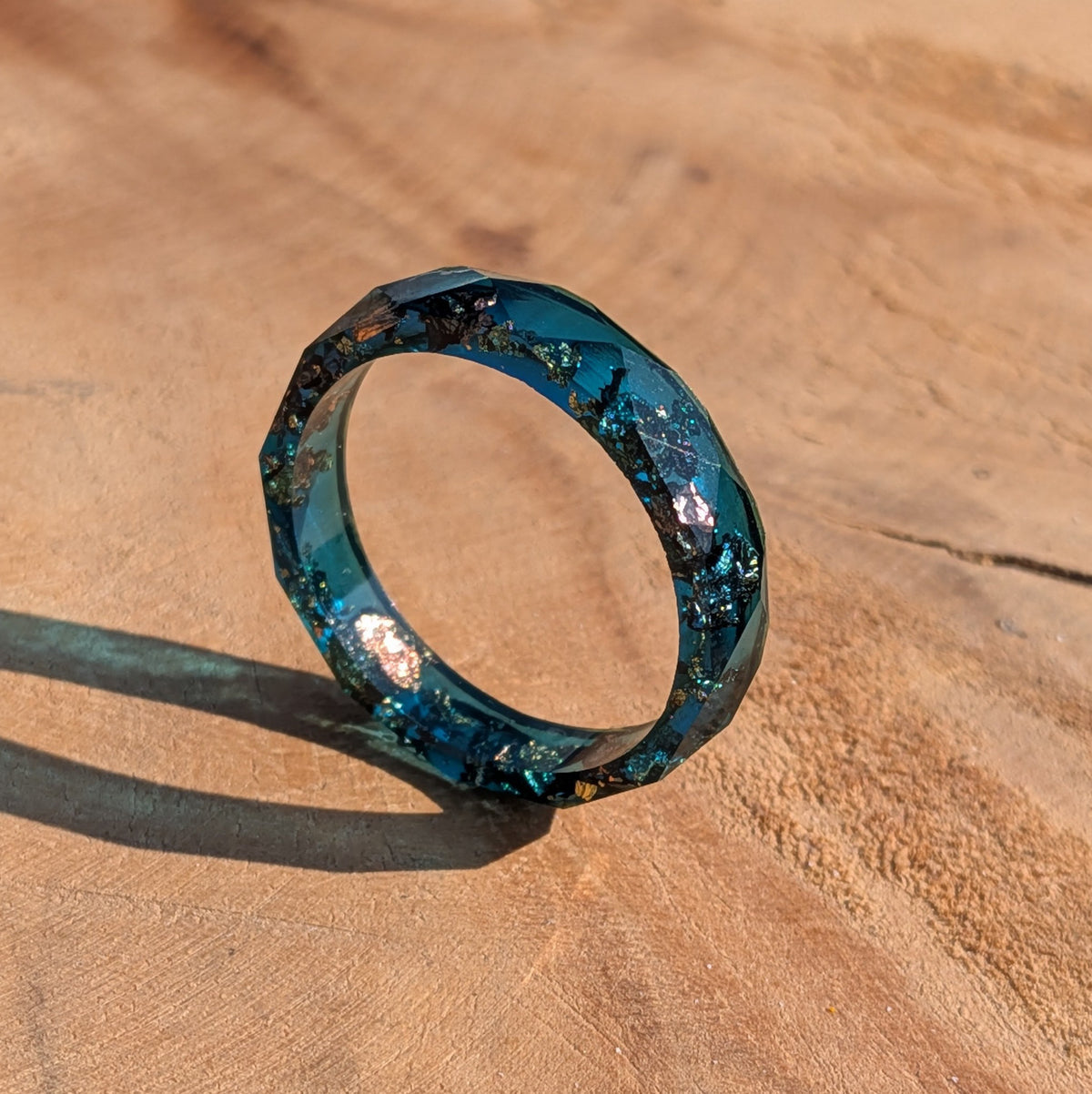 Deep blue resin statement ring with shimmering metallic flakes by EL-Creations