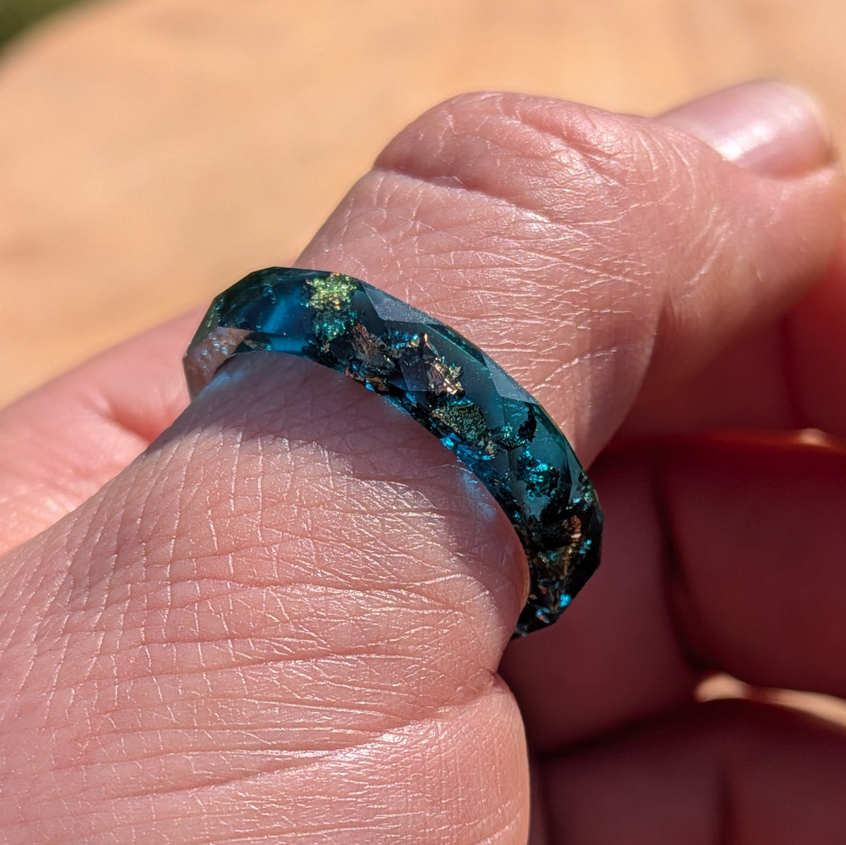 Glossy deep blue resin jewelry with gold and silver flakes by EL-Creations