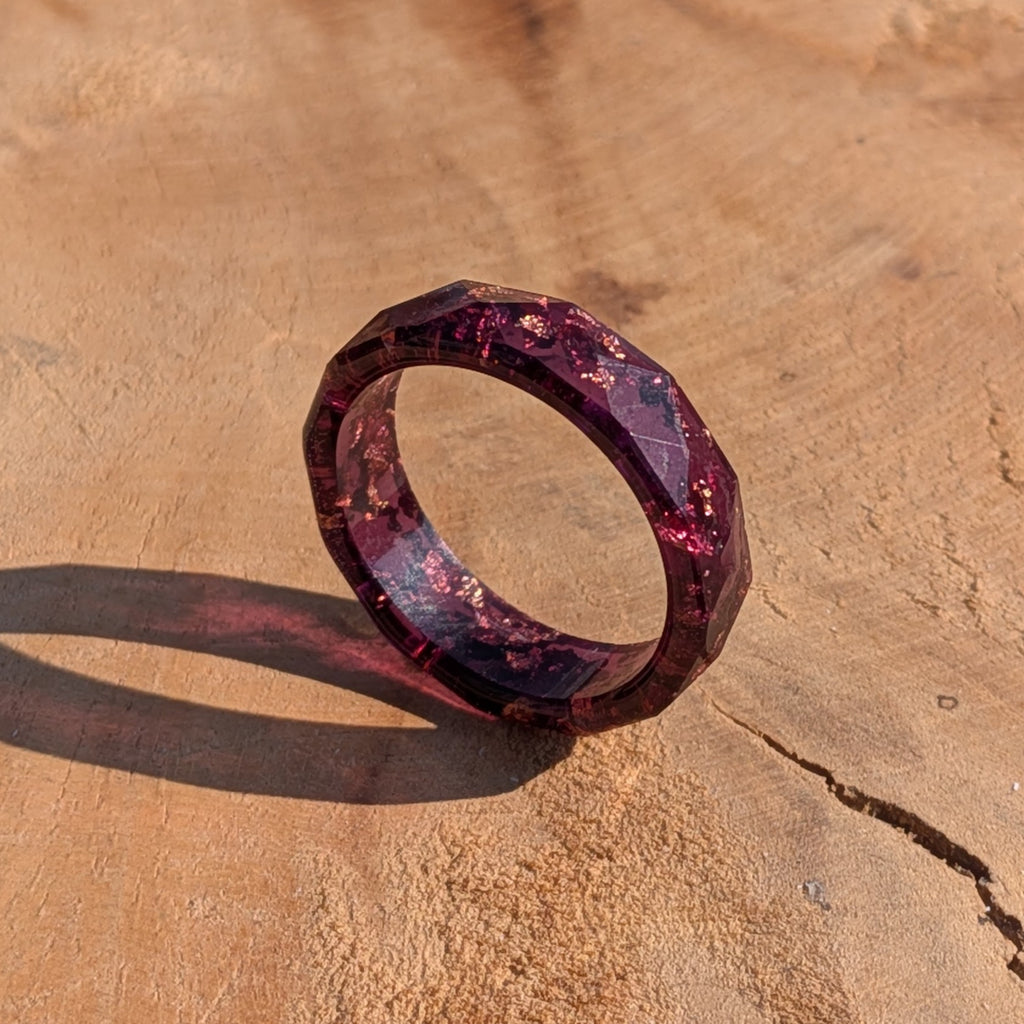 Purple ring on a textured brown surface
