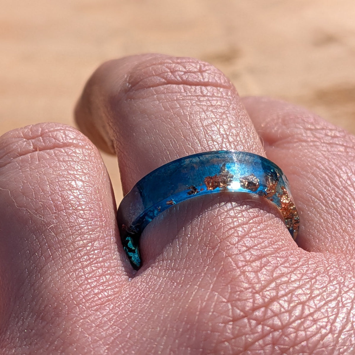 Deep blue resin ring with metallic copper flakes – EL-Creations