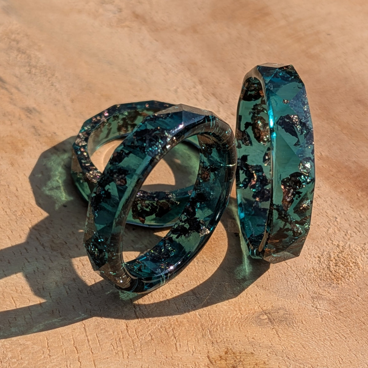 Pastel green resin statement ring with shimmering copper flakes by EL-Creations