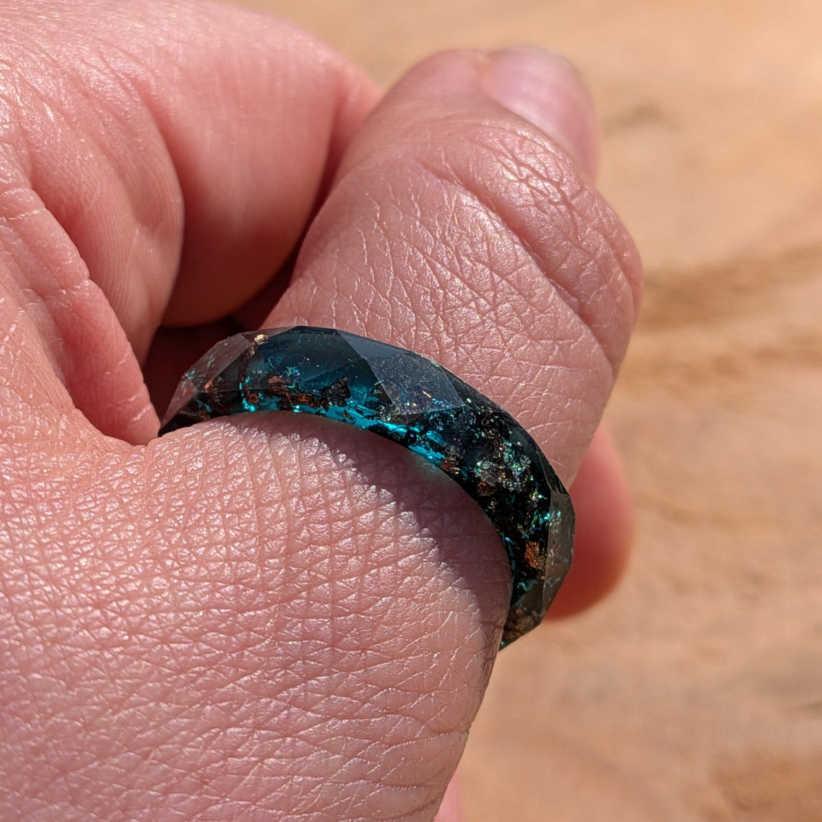 Elegant handmade resin ring in sage green with metallic details by EL-Creations
