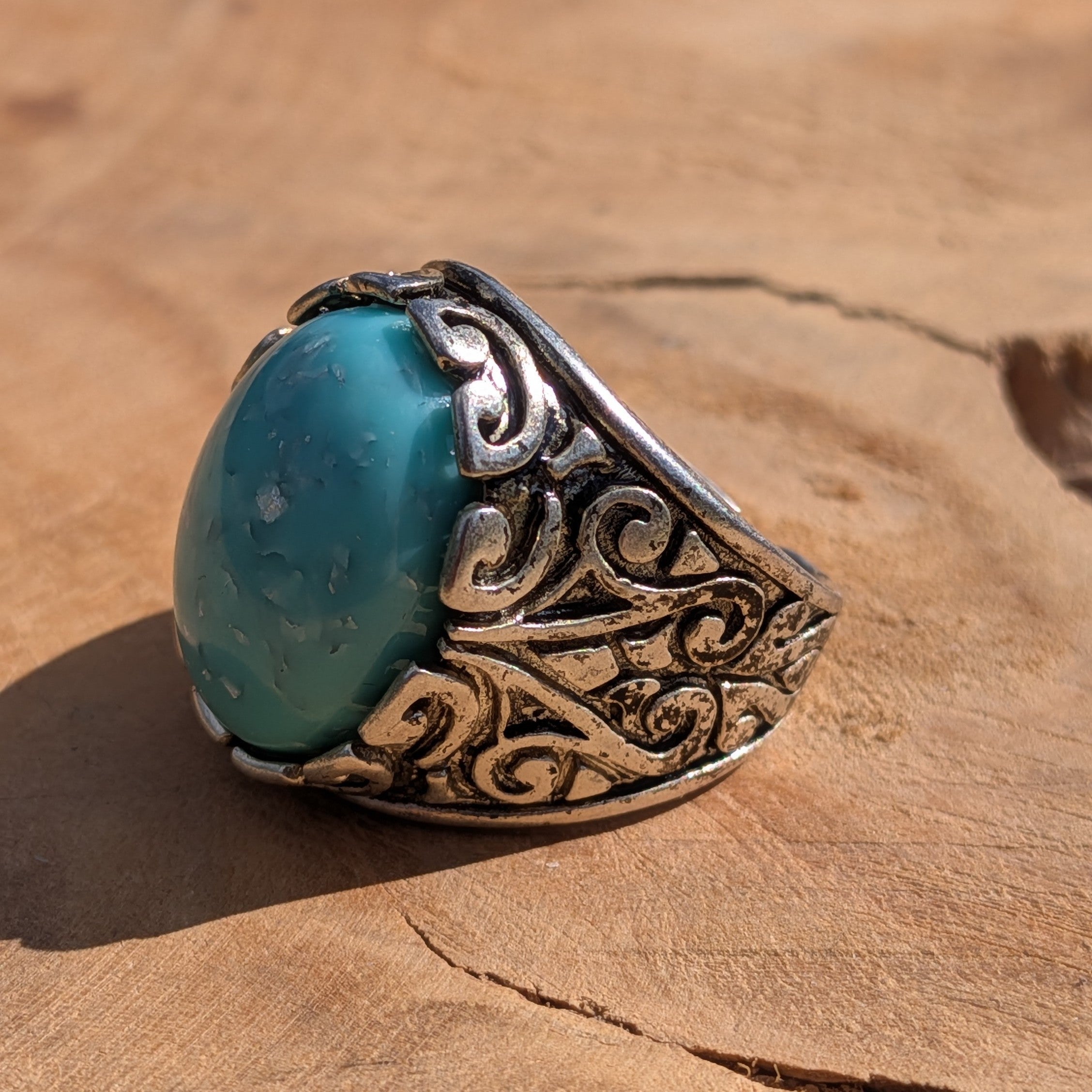 Turquoise resin ring antique silver claw setting front view worn on hand – EL-Creations