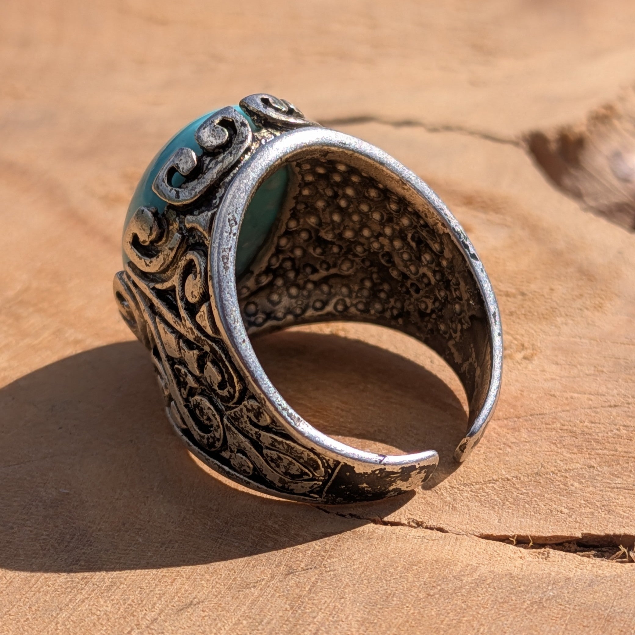 Turquoise resin ring antique silver filigree top view worn on finger teal blue cabochon – EL-Creations