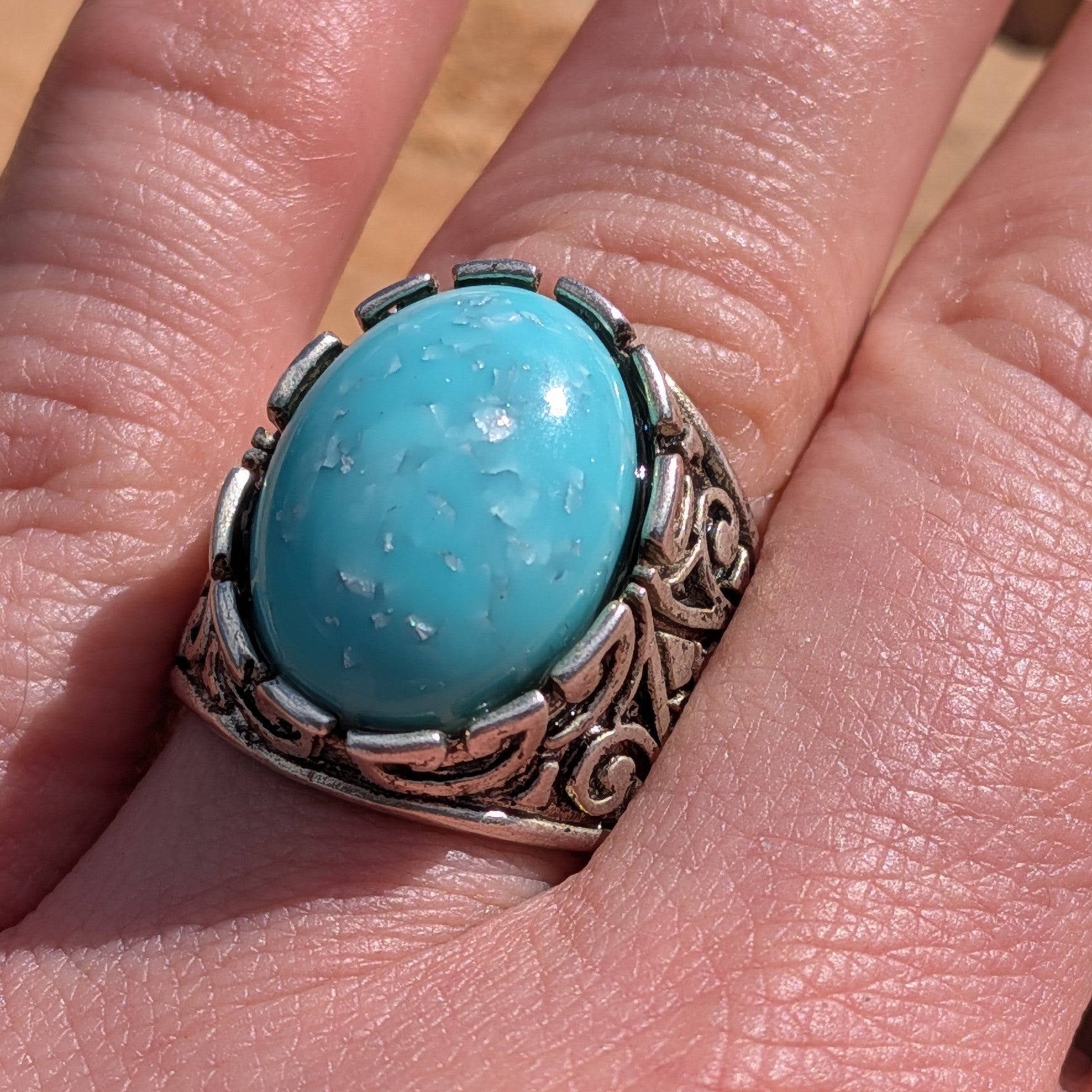 Turquoise resin ring antique silver wide band worn on finger side view in sunlight – EL-Creations