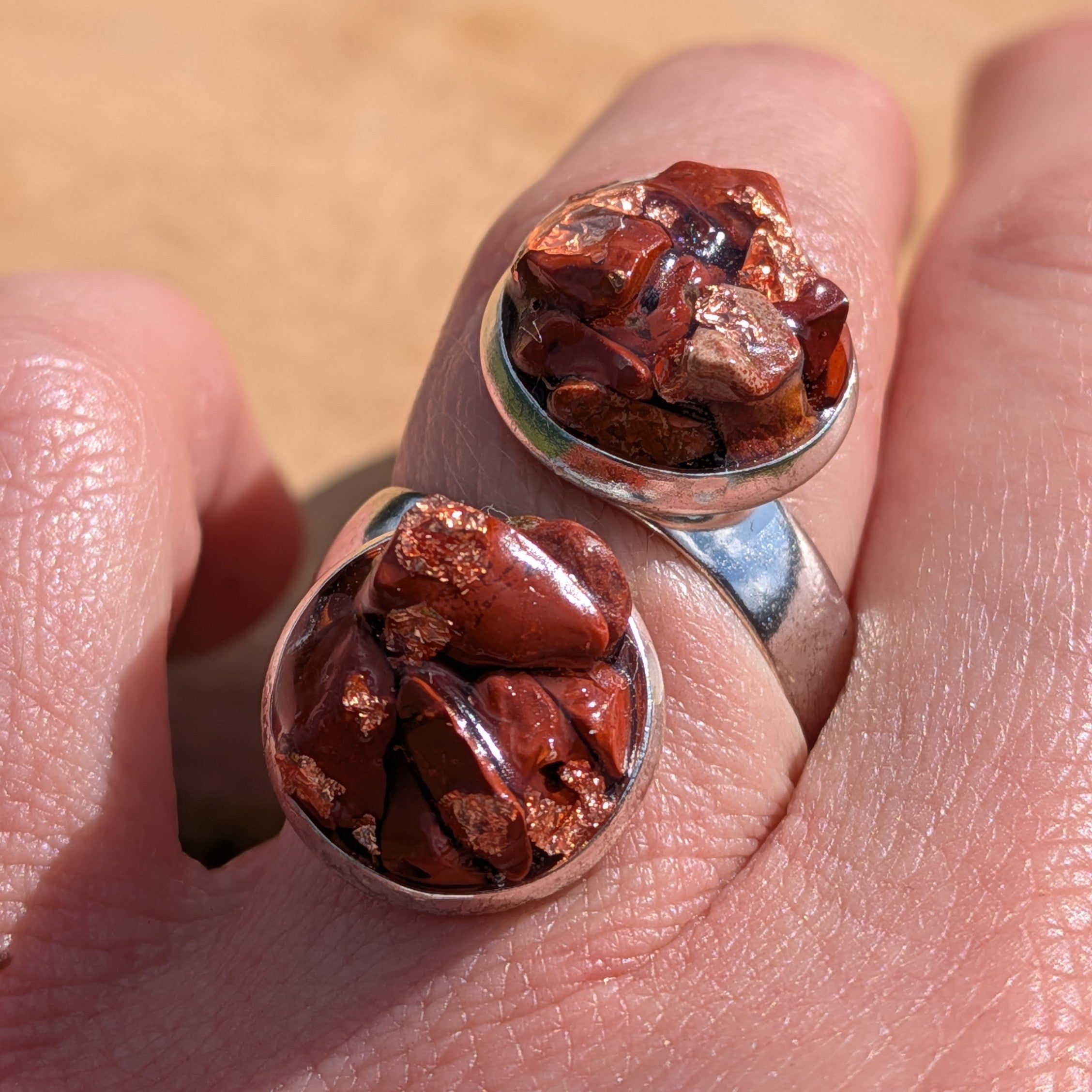 Handcrafted red jasper double stone ring on hand, two round silver alloy settings with natural jasper clusters – EL-Creations