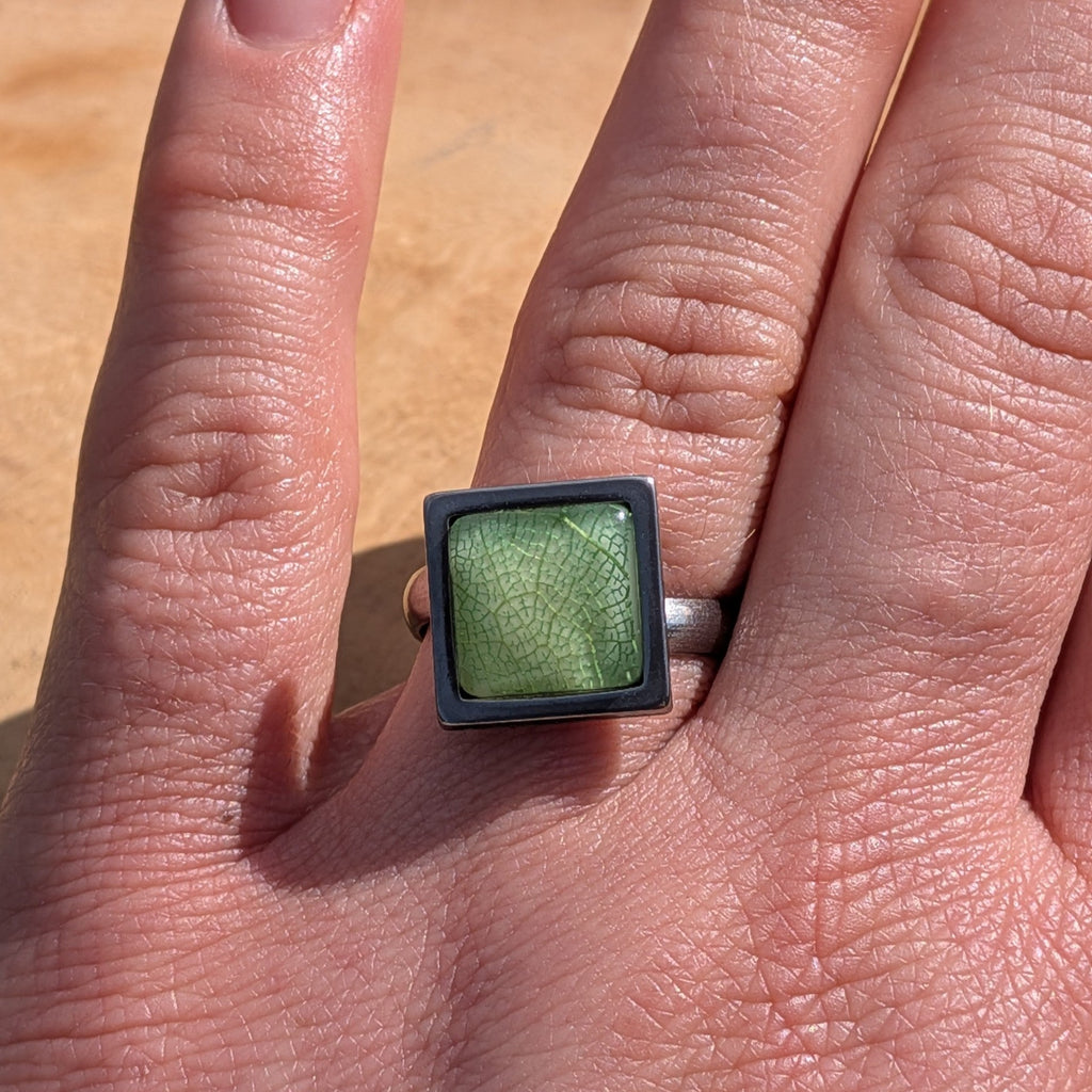 Handcrafted green skeleton leaf resin ring on hand, square stainless steel setting 14mm – EL-Creations