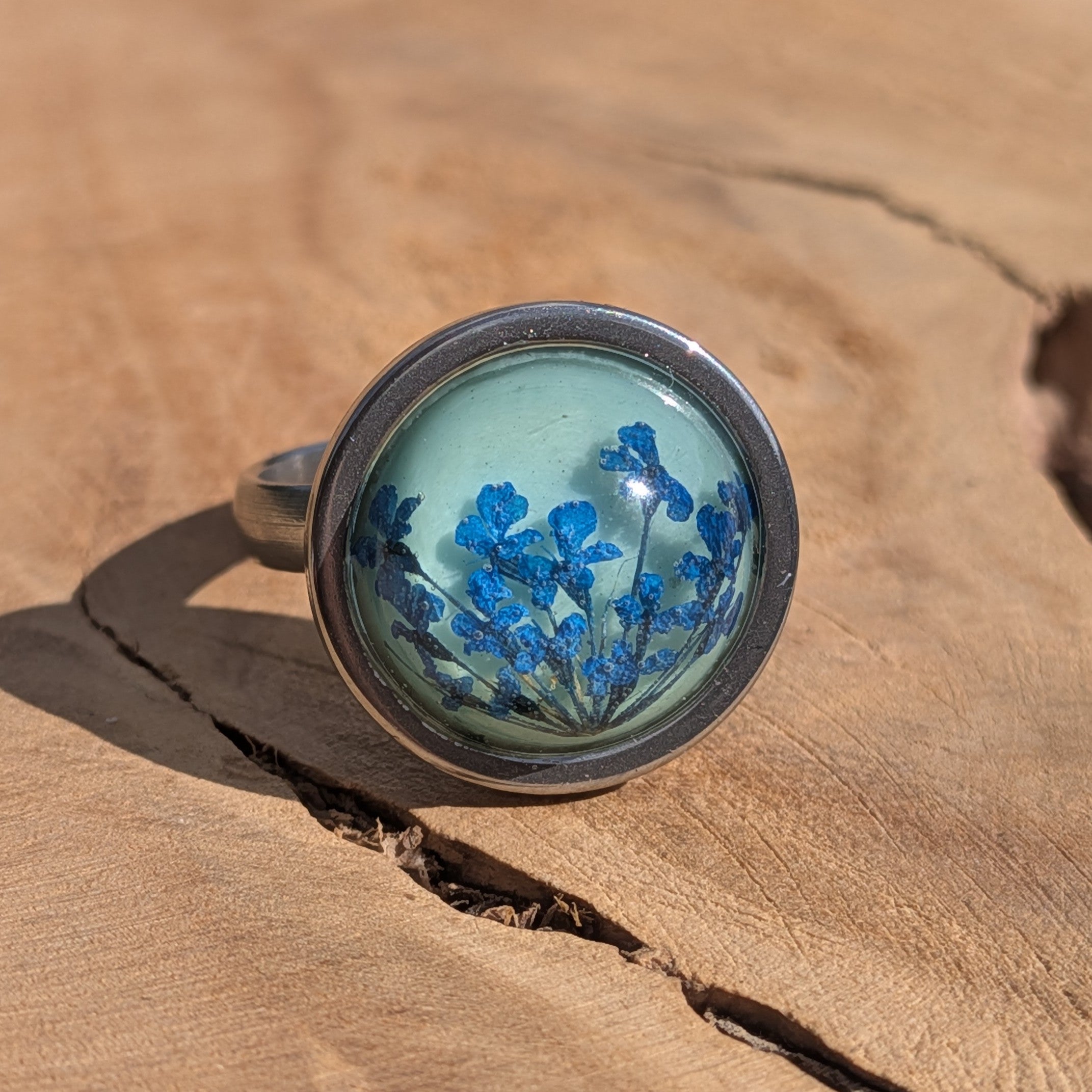 Blue Queen Anne's Lace resin ring on wood, 16mm teal cabochon in stainless steel round bezel – EL-Creations