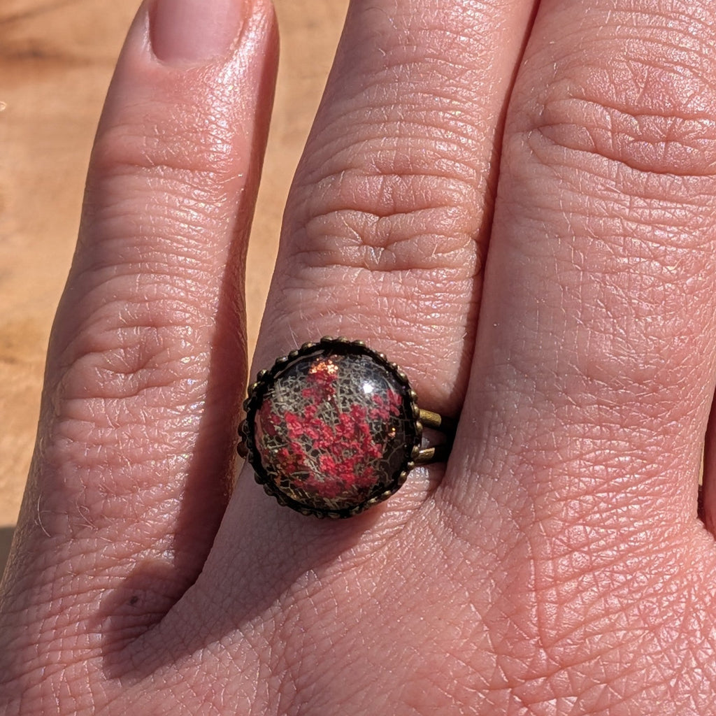 Handcrafted red Queen Anne's Lace skeleton leaf resin ring on hand, antique bronze crown bezel – EL-Creations