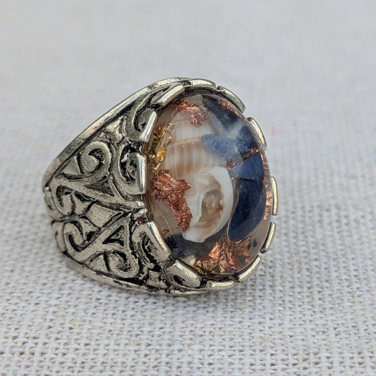 Crystal resin statement ring sodalite shell copper flakes 18x15mm oval cabochon top view – EL-Creations