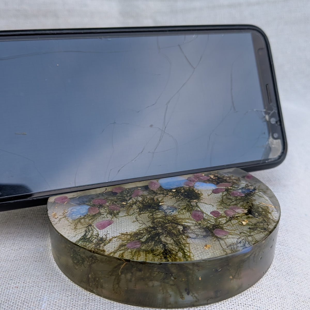 Resin phone stand with natural botanical elements 