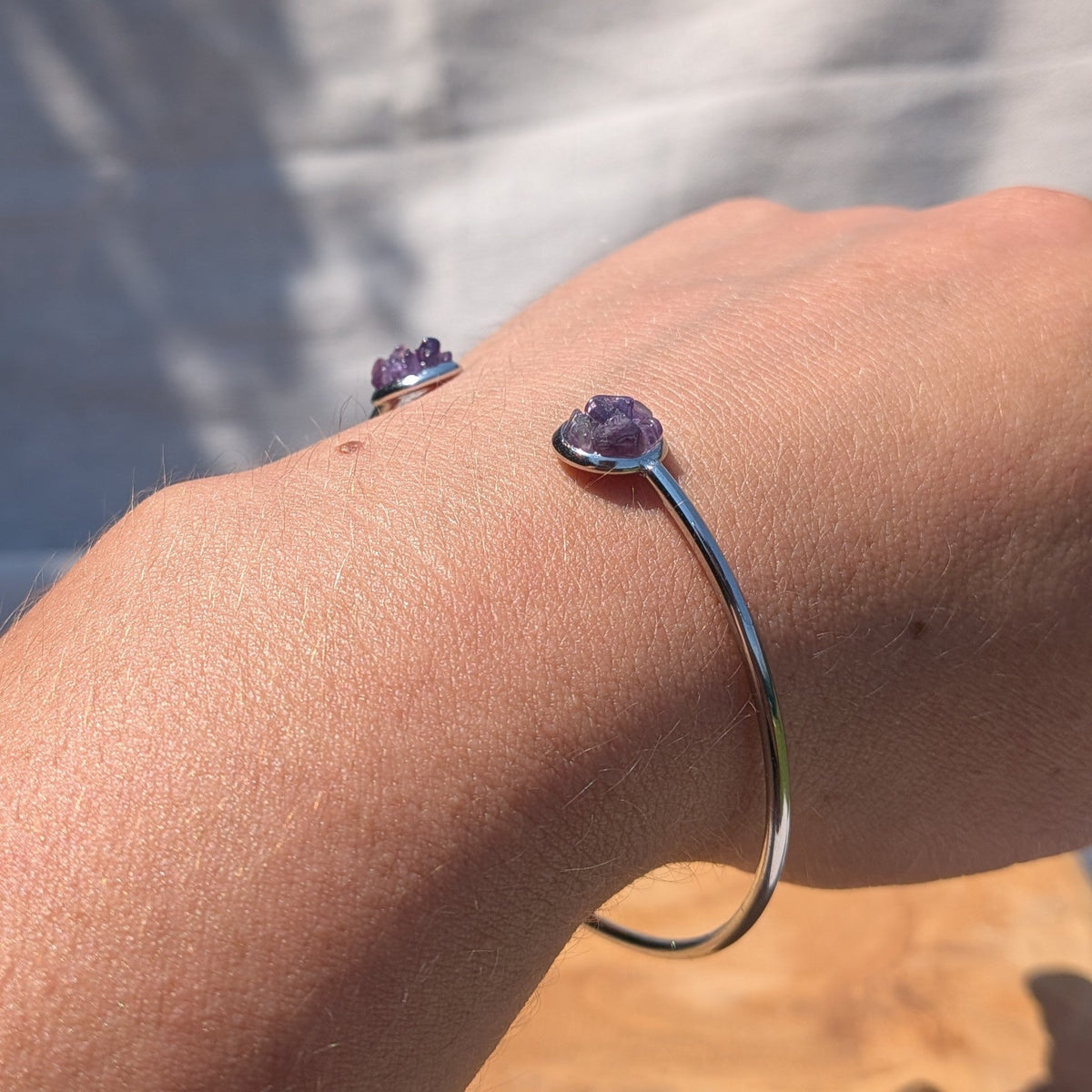Raw amethyst open cuff bracelet detail shot on wrist – EL-Creations