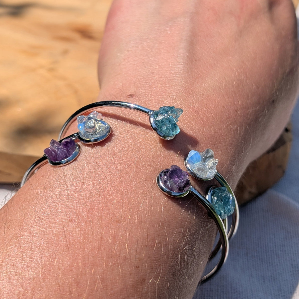 Forget-me-not resin cuff bracelet with crystal bracelets lifestyle shot on wrist – EL-Creations