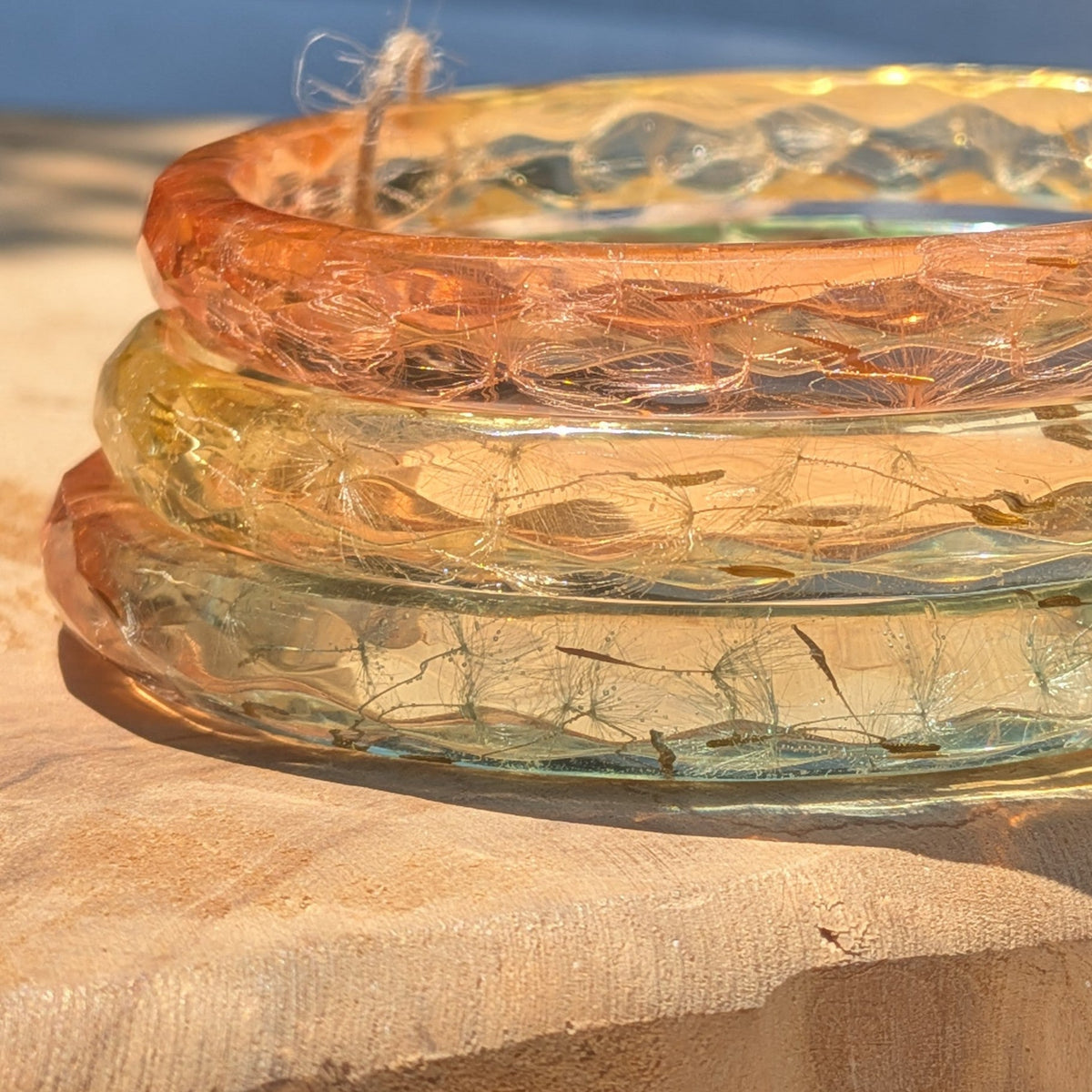 Peach and yellow dandelion seed resin bangle bracelet close-up by EL-Creations