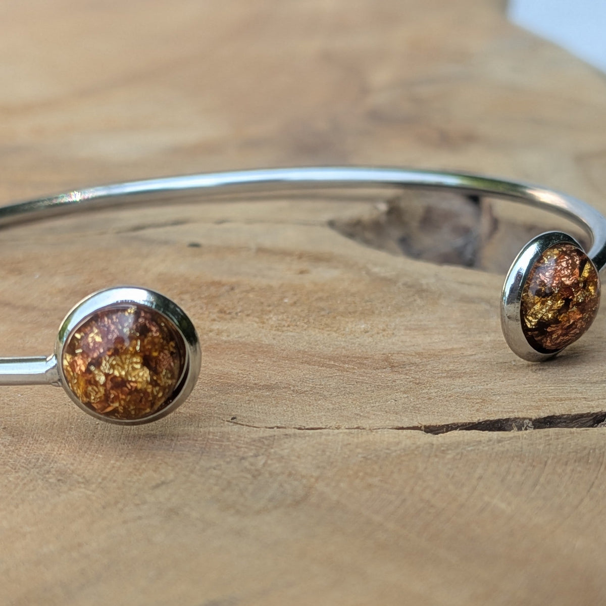 Amber resin open cuff bracelet on driftwood detail shot – EL-Creations