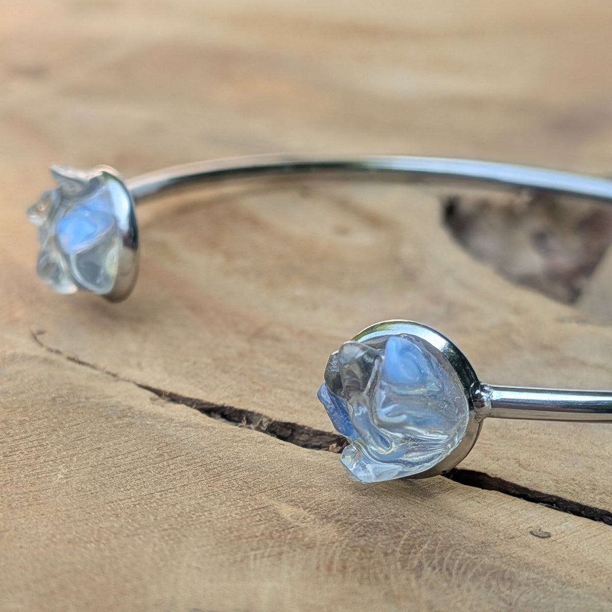 Close-up of moonstone crystal set in stainless steel bezel cuff bracelet – EL-Creations