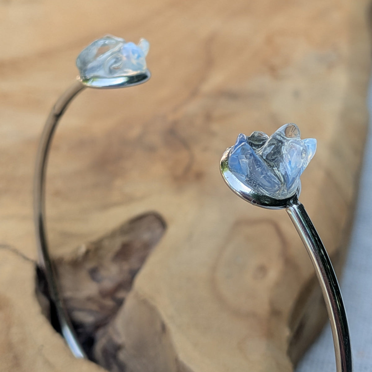 Moonstone cuff bracelet detail shot on driftwood – EL-Creations